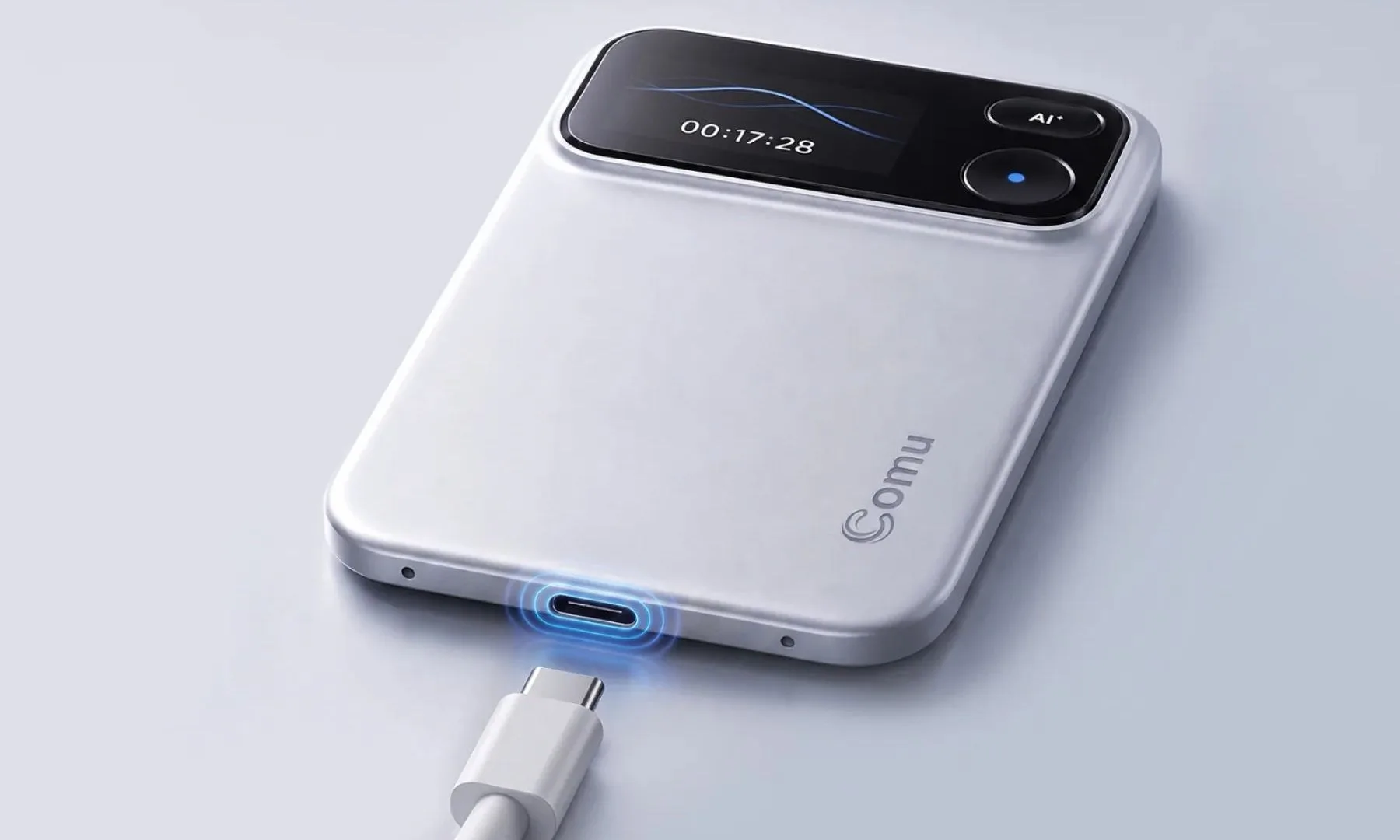 Comu Action Pro AI voice recorder in hand